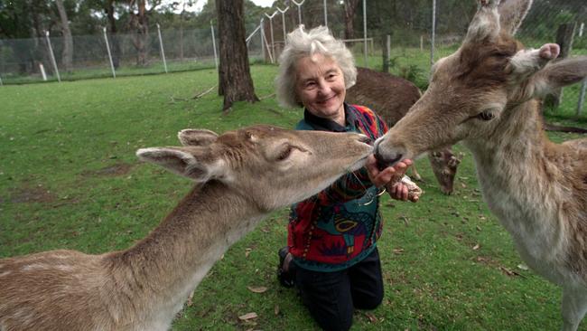 Ruth Heffer feeds some of the deer at Maru Park.