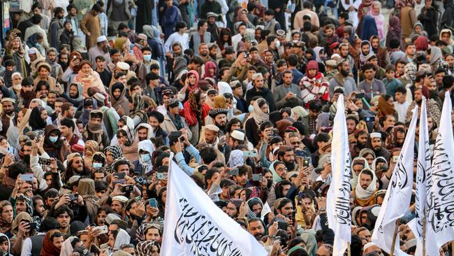 Afghan nationals wave Taliban flags during celebrations in Khost province on December 8, 2024, to mark the end of Syrian dictator Bashar al-Assad's rule after rebel fighters took control of the Syrian capital Damascus. Picture: AFP