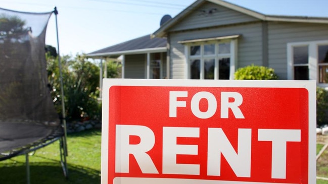 A For Rent Sign Outside a House.