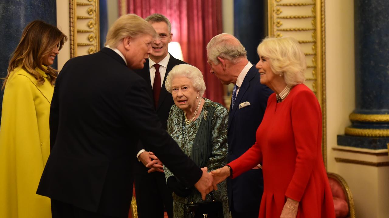 The late Queen Elizabeth - along with Charles and Camilla - hosted then-US President Donald Trump and wife Melania at a reception for NATO leaders at Buckingham Palace in 2019. Picture: Geoff Pugh - WPA Pool/Getty Images