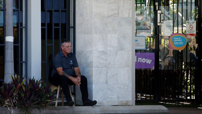 Security has been posted at the Goodstart Cairns daycare centers. A security guard keeps watch at the door of the Goodstart daycare center on Sheridan St, Cairns North. PICTURE: STEWART MCLEAN