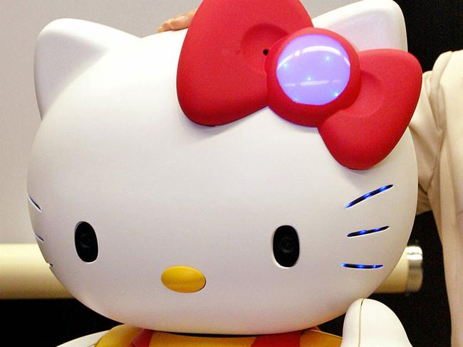 Computer company NEC and robotic venture Business Design Laboratory unveils in Tokyo, 12 Jul 2004 the prototype model of communication robot "Hello Kitty Robo", which is able to recognize human voices, faces, and speak thousands of phrases. AFP PicYoshikazu/Tsuno technology