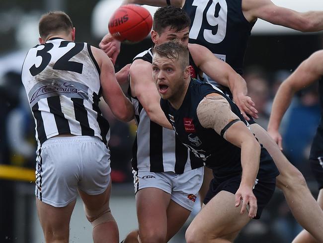 Berwick and Narre Warren lock horns in the AFL Outer East grand final. Picture: Josie Hayden