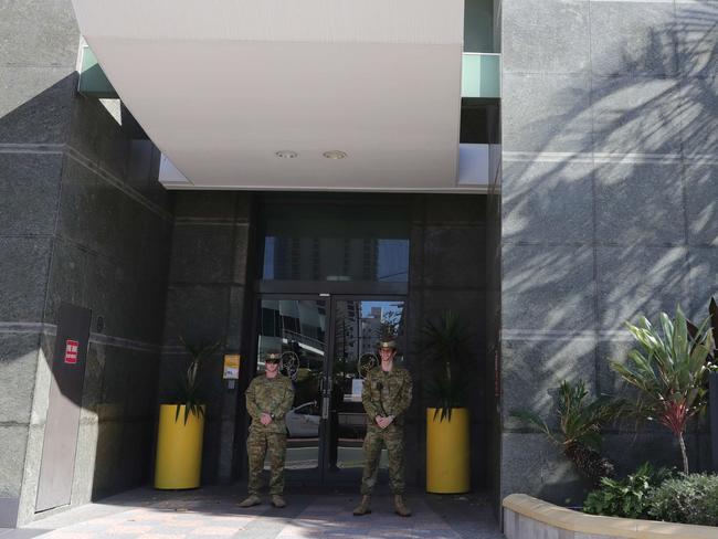 The Army rolled into Surfers Paradise to stand guard outside the Voco Hotel, where passengers from overseas are in quarantine. Picture Glenn Hampson.