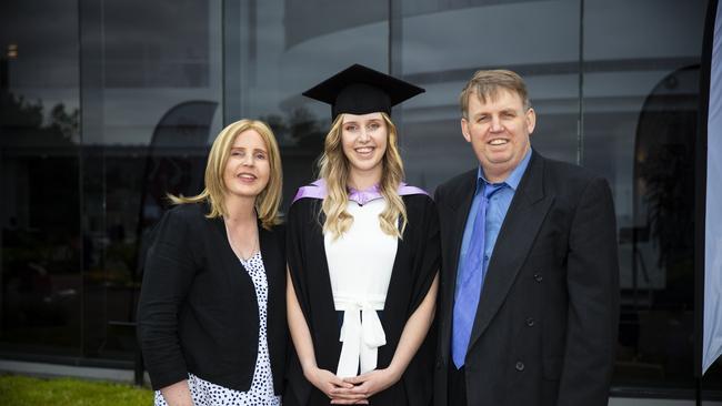 Emily Palmer with her parents. University of Tasmania Graduations. Federation Concert Hall, Hobart. Picture: RICHARD JUPE