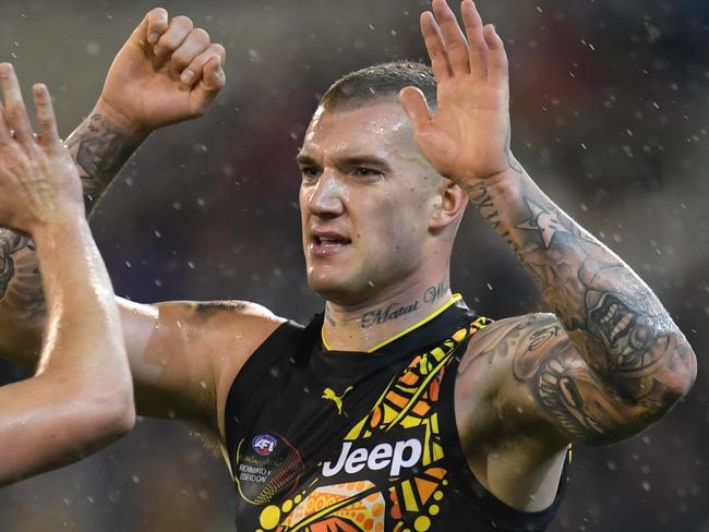 Dustin Martin (right) and Jayden Short of the Tigers react after the final siren during the Round 10 AFL match between the Richmond Tigers and the Essendon Bombers at the MCG in Melbourne, Saturday, May 27, 2017. (AAP Image/Julian Smith) NO ARCHIVING, EDITORIAL USE ONLY