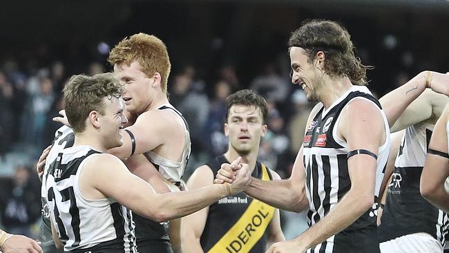 Jack Strange and Jarrod Lienert celebrate after the siren Picture SARAH REED