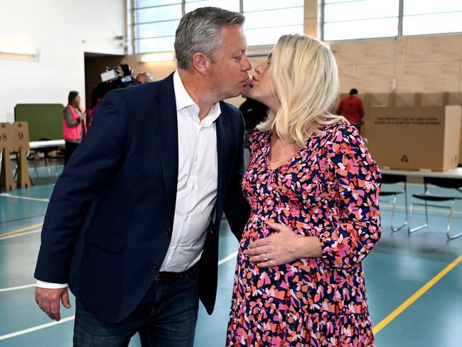 GOLD COAST, AUSTRALIA - NewWire Photos - JULY 15, 2023. LNP candidate for the federal seat of Fadden, Cameron Caldwell and his wife Lauren kiss after voting at Coomera Rivers State School in the seatÃs by-election, following the resignation of Stuart Robert.Picture: Dan Peled / NCA Newswire