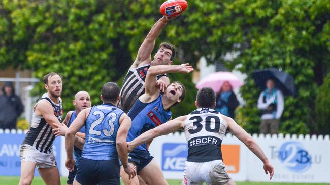 AFL-listed ruckman Scott Lycett shows his craft against Sturt on Sunday. Picture: AAP/Brenton Edwards