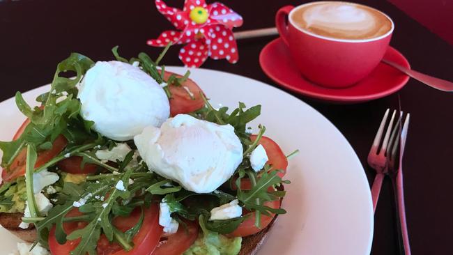 Smashed avocado on toast with poached eggs. Picture: Jenifer Jagielski