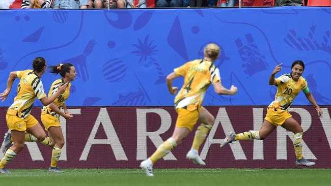 Sam Kerr, right, of Australia celebrates after scoring the opening goal during the 2019 FIFA Women's World Cup France group C match. Picture: Getty