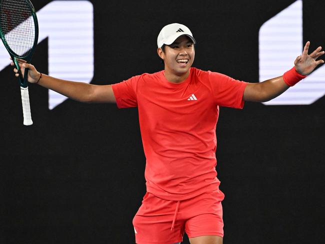 USA's Learner Tien celebrates victory against Russia's Daniil Medvedev during their men's singles match on day five of the Australian Open tennis tournament in Melbourne on January 17, 2025. (Photo by Paul Crock / AFP) / -- IMAGE RESTRICTED TO EDITORIAL USE - STRICTLY NO COMMERCIAL USE --