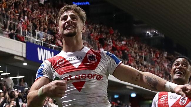 WOLLONGONG, AUSTRALIA - JUNE 07:  Zac Lomax of the Dragons celebrates after scoring a try during the round 14 NRL match between St George Illawarra Dragons and Wests Tigers at WIN Stadium on June 07, 2024, in Wollongong, Australia. (Photo by Jason McCawley/Getty Images)