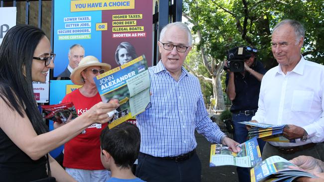 Prime Minister Malcolm Turnbull with the Liberal candidate John Alexander at Gladesville Public School. Picture: Tim Hunter