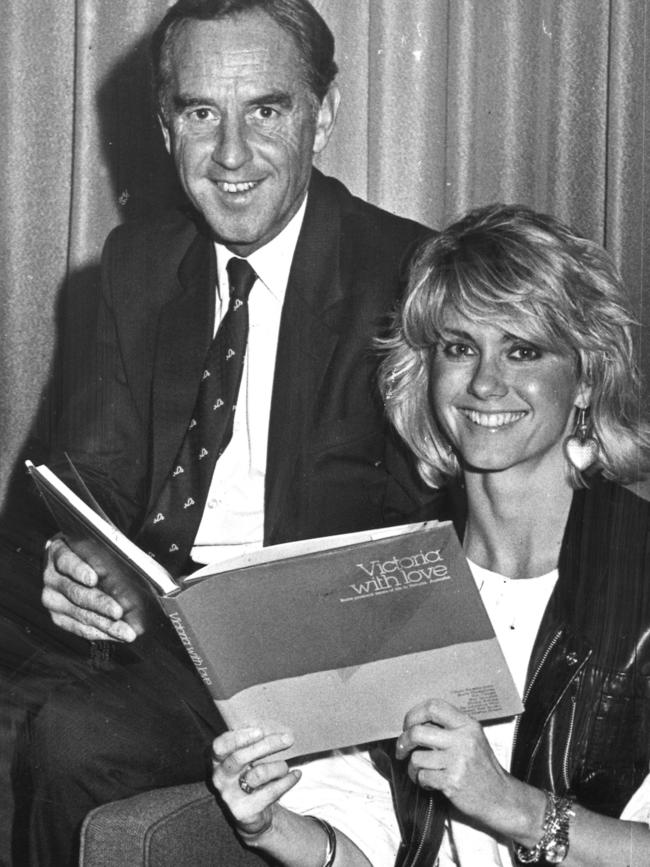 John Cain meets Olivia Newton-John in 1984.