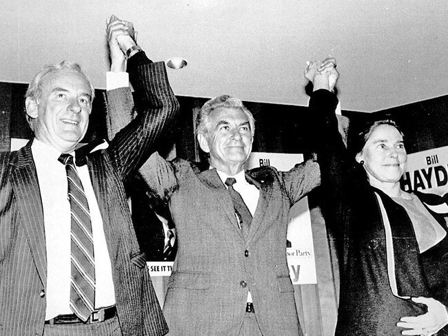 Prime minister Bob Hawke is flanked by Bill Hayden and his wife Dallas at Hayden's federal election campaign launch at Ipswich in 1987.