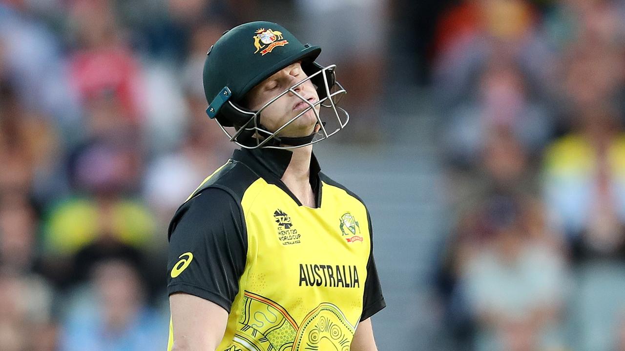 ADELAIDE, AUSTRALIA - NOVEMBER 04: Steve Smith of Australia out LBW for 4 runs bowled Naveenulhaq Murid of Afghanistan during the ICC Men's T20 World Cup match between Australia and Afghanistan at Adelaide Oval on November 04, 2022 in Adelaide, Australia. (Photo by Sarah Reed/Getty Images)