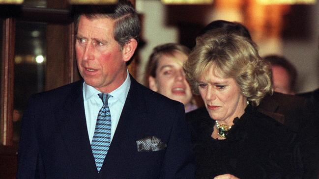 Then Prince Charles with Camilla Parker Bowles leaving the Ritz Hotel in London on January 28, 1999.