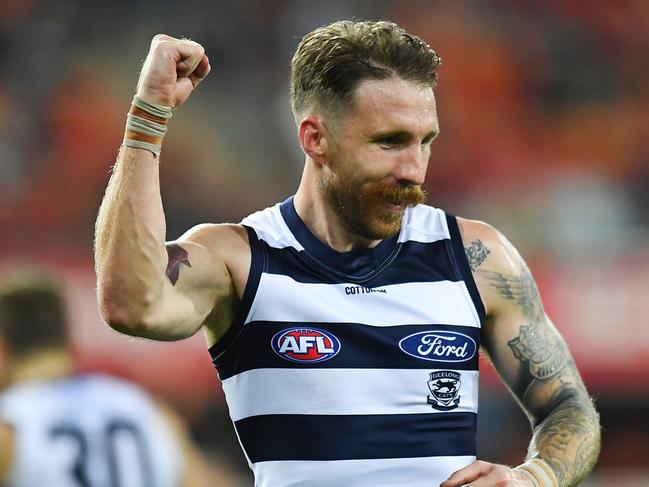 GOLD COAST, AUSTRALIA - AUGUST 13: Zach Tuohy of the Cats celebrates kicking a goal during the round 22 AFL match between the Gold Coast Suns and the Geelong Cats at Metricon Stadium on August 13, 2022 in Gold Coast, Australia. (Photo by Albert Perez/AFL Photos/via Getty Images)