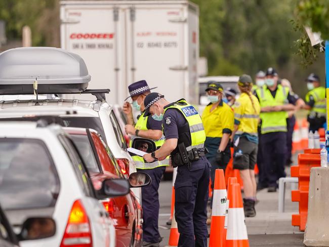 ALBURY NSW, AUSTRALIA - DECEMBER 31ST, 2020:Traffic on the Lincoln Causeway between Albury Wodonga backing up as people try to pass through the check point into Victoria between Albury and Wodonga. Extra police have been put on the check point as the Hume Freeway check point has been closed because of a truck fire blocking the Hume Freeway.Picture: Simon Dallinger