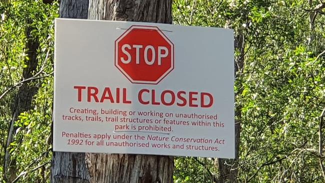 A sign showing some of the Nerang forest trails being closed off to bike riders in the Gold Coast hinterland.