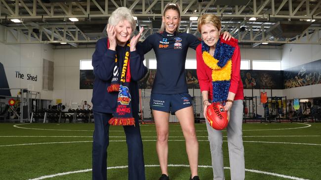 Deni Varnhagen (C) with her grandmothers Beryl Stutchbury (L) and Eva Rudolph (R) have a laugh ahead of the AFLW grand final. Picture: Tait Schmaal 