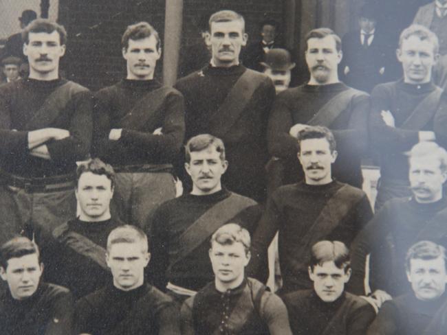 Forward Charlie Moore (second from left, top row) lines up with Essendon’s 1897 squad.