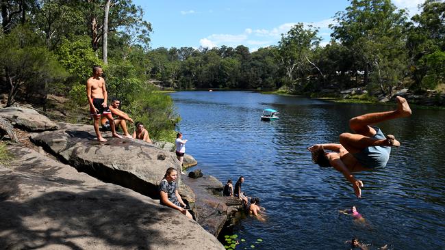 People are seen cooling off in Parramatta, which has a high percentage of people exposed to high urban heat. Picture: AAP Image/Dan Himbrechts