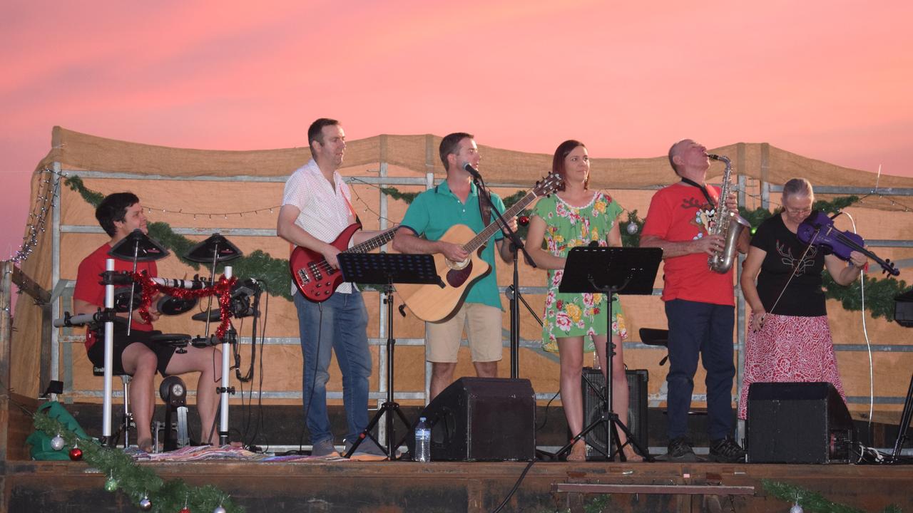 The Jandowae Combined Churches band lead the carols.