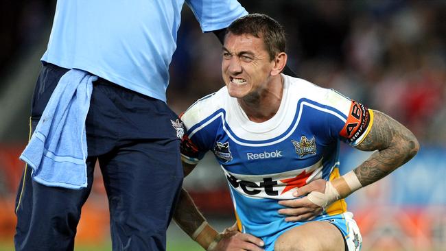 Mat Rogers grimaces during the Round 13 NRL game between the Gold Coast Titans vs St George Illawarra Dragons at Skilled Park Robina.