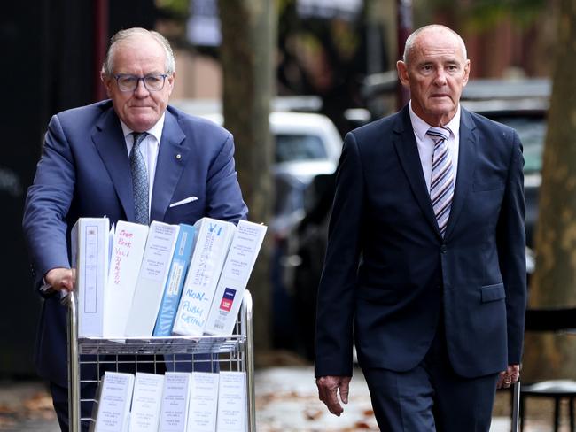 SYDNEY, AUSTRALIA - NewsWire Photos MAY 9, 2022:  Chris Dawson pictured (right) as he arrives at the Supreme Court, Sydney CBD. Ex-Newtown Jets player and school teacher Chris Dawson was charged with murdering his wife Lynette in 1982.Picture: NCA NewsWire / Damian Shaw