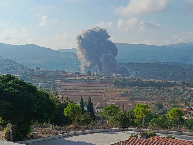 Smoke billows from the site of an Israeli air strike on Zibqin in southern Lebanon on August 25, amid escalations in the ongoing cross-border tensions as fighting continues between Israel and Hamas militants in the Gaza Strip. Picture: Kawnat Haju/AFP