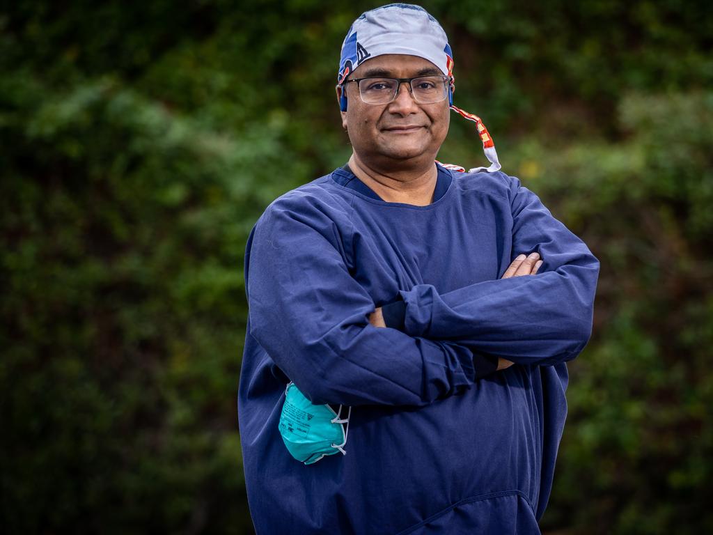 Dr Mukesh Haikerwal administers Covid vaccines. Picture: Jake Nowakowski