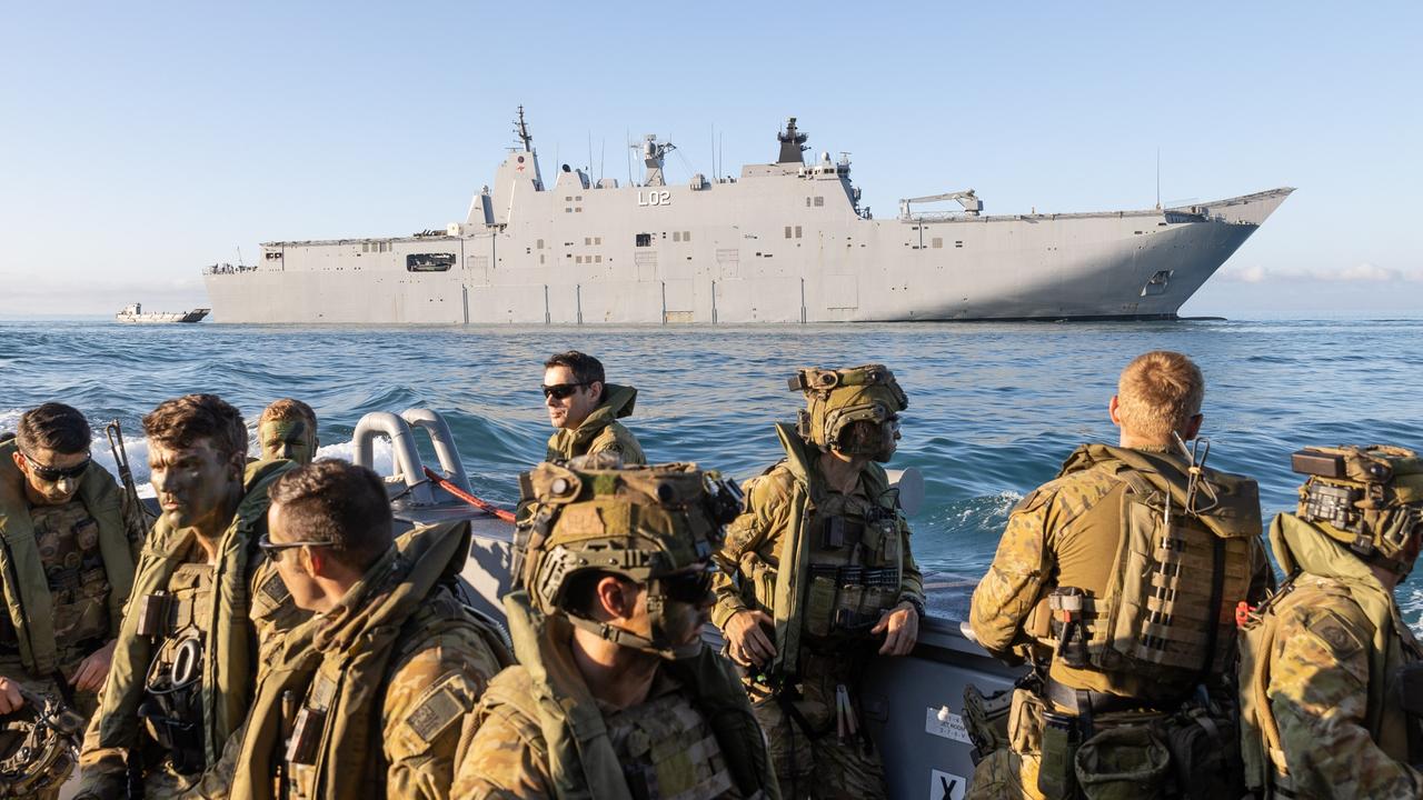 Personnel from 3rd Battalion Royal Australian Regiment, are transported from HMAS Canberra, prior to a beach assault on Forrest Beach, Queensland, during Exercise Talisman Sabre 2021.