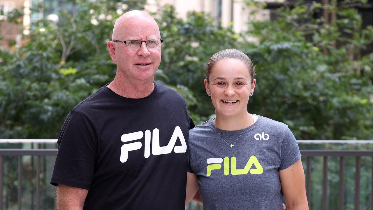 Tennis coach Craig Tyzzer with champion player Ash Barty during her retirement press conference in 2022. Picture: Liam Kidston.