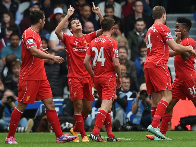 Philippe Coutinho celebrates his late goal.