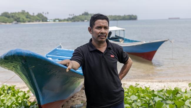 Sarahuddin outside his house in Fatufia Village, Morowali, Central Sulawesi. Picture:: Garry Lotulung.