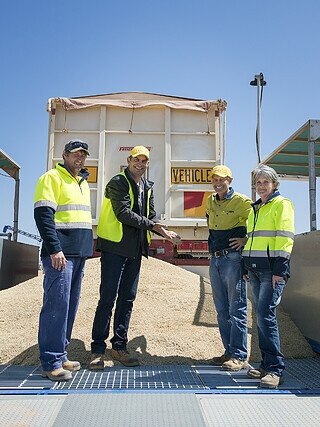 T-Ports site leader Jeff Cowan, T-Ports general manager of operations Tim Gurney, grower Tony Kaden, Mitchellville, and T-Ports site and quality manager Karen Dorman with the first load of grain delivered to T-Ports’ Lucky Bay site. Picture: BARB WOOLFORD