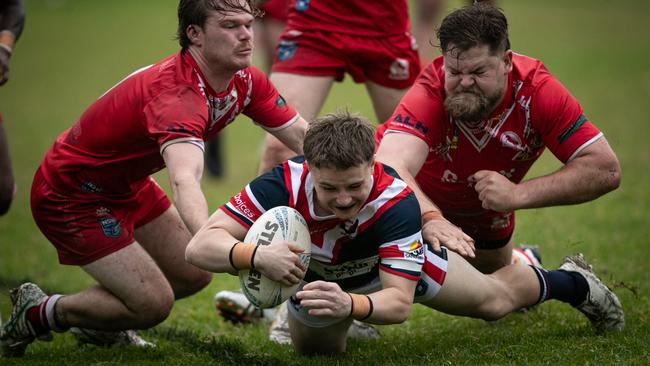 Seb Plaister crashing over for a try. Julian Andrews
