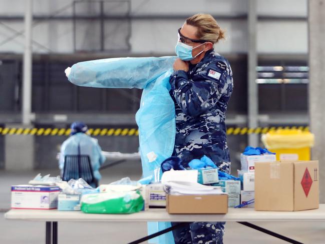 ADF personnel at a COVID testing site at the Melbourne showgrounds. Picture: Aaron Francis