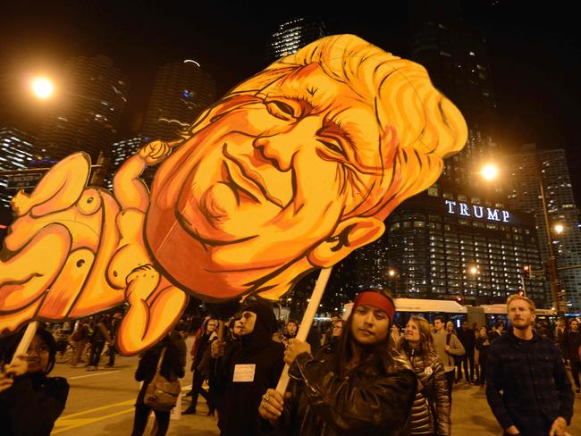 People take part in a protest near the Trump tower, against President-elect Donald Trump in Chicago, Illinois on November 9, 2016. Picture: AFP