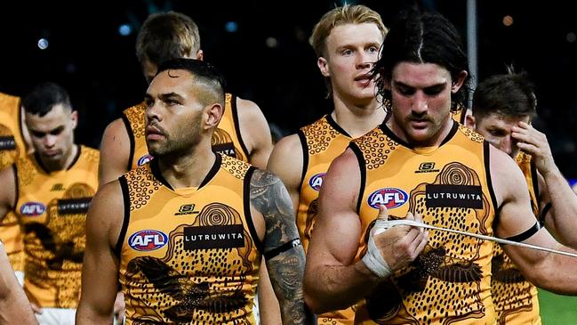 ADELAIDE, AUSTRALIA - MAY 19: Hawthorn players  leave the ground after losing  the round 10 AFL match between Yartapuulti (the Port Adelaide Power) and Hawthorn Hawks at Adelaide Oval, on May 19, 2024, in Adelaide, Australia. (Photo by Mark Brake/Getty Images)