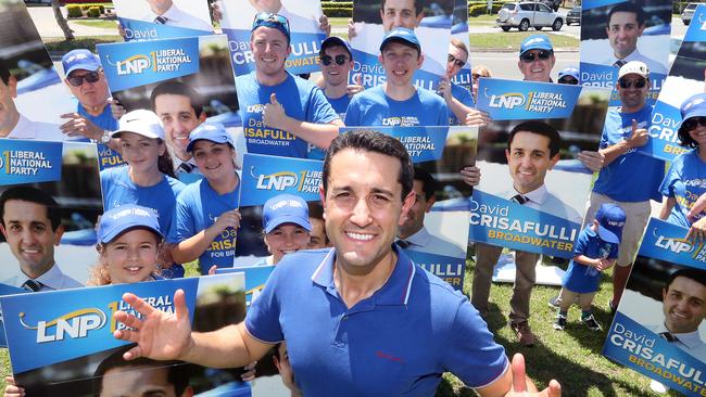 LNP Broadwater candidate David Crisafulli is in campaign mode at corner of Lae Drive and Oxley Ave, Runaway Bay, hitting the ground running yesterday. Photo by Richard Gosling