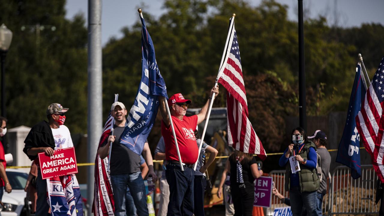 Supporters of President Donald Trump gather outside of Walter Reed National Military Medical Center after the President was admitted for treatment of COVID-10. Picture: AFP