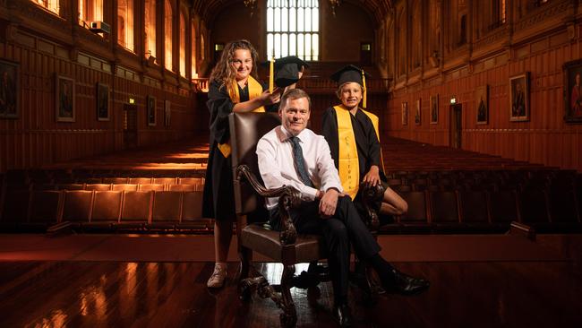 Vice-Chancellor Professor Peter Rathjen AO, with Children's University Australia students Molly 11 and Miller 9 in Bonython Hall. Picture: Brad Fleet