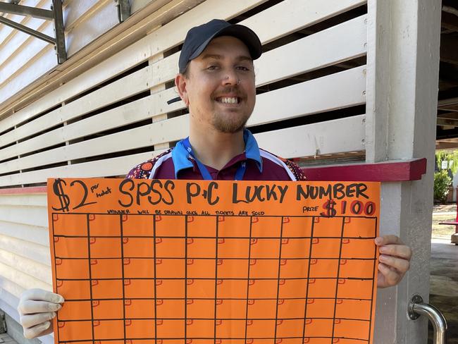 Slade Point State School P&amp;C president Dev Brown encourages people to come and get a snag and a cold drink to support the P&amp;C. Picture: Paul Brescia