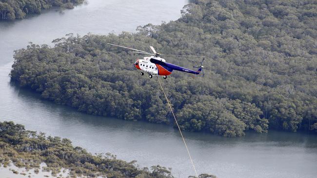 'Mad Max' practices its 5000-litre water dispersal in Brisbane. Picture: AAP