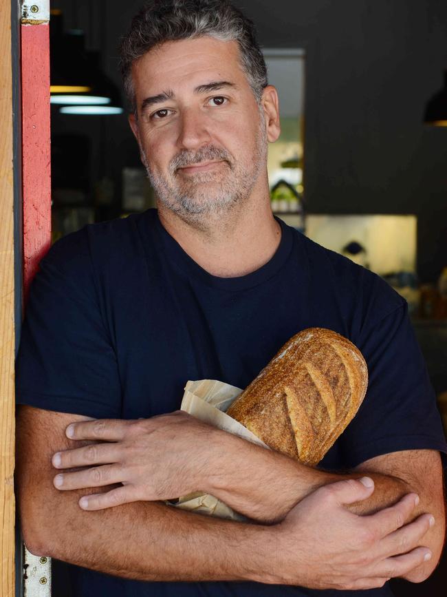 Gareth Grierson with some of the bread his Red Door Bakery was celebrated for. Picture: AAP Image/ Brenton Edwards