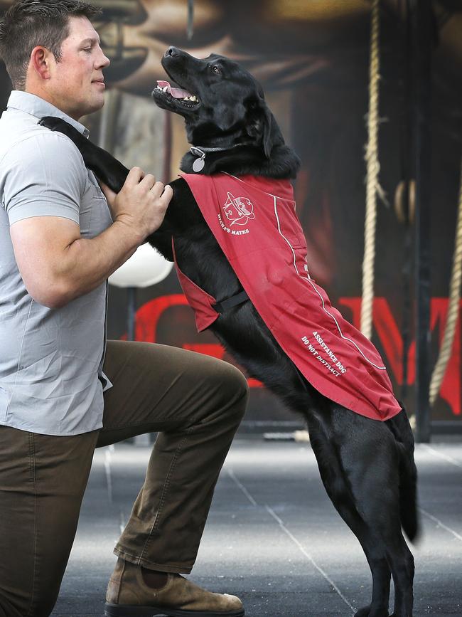 Craig Gresham with his assistance dog Misha. Off leash parks need to consider the increasing number of assistance dogs in community. PICTURE CHRIS KIDD