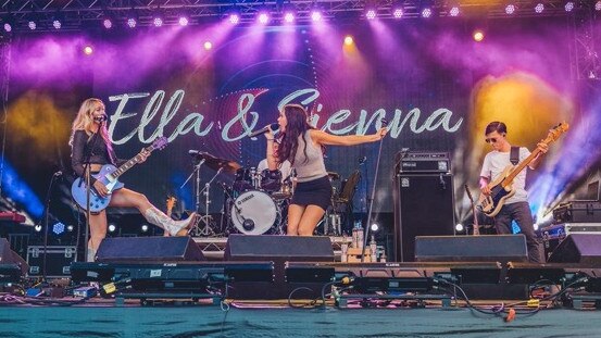 Ella McLean, left, performs with her sister Sienna McLean as country duo Ella &amp; Sienna. Picture: Supplied